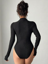 New Elegant Commuter Style Black Asymmetrical Twisted Hollow Collar Butterfly Metallic Accent Fitted Bodysuit, Slimming Silhouette